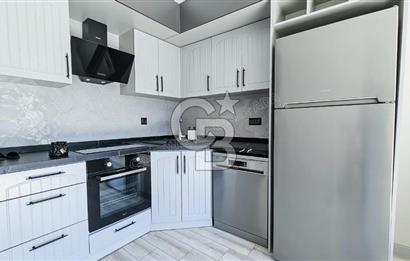 Kuşadası Kuştur Plajı ‘na Yürüme Mesafesinde 1+1 şık eşyalı kiralık daire