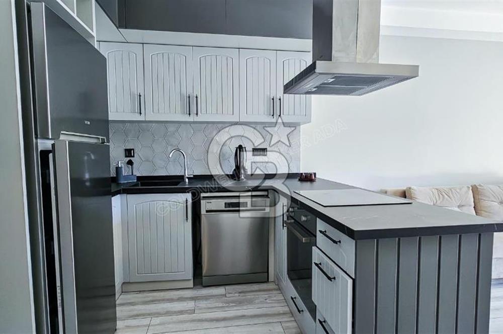 Kuşadası Kuştur Plajı ‘na Yürüme Mesafesinde 1+1 şık eşyalı kiralık daire