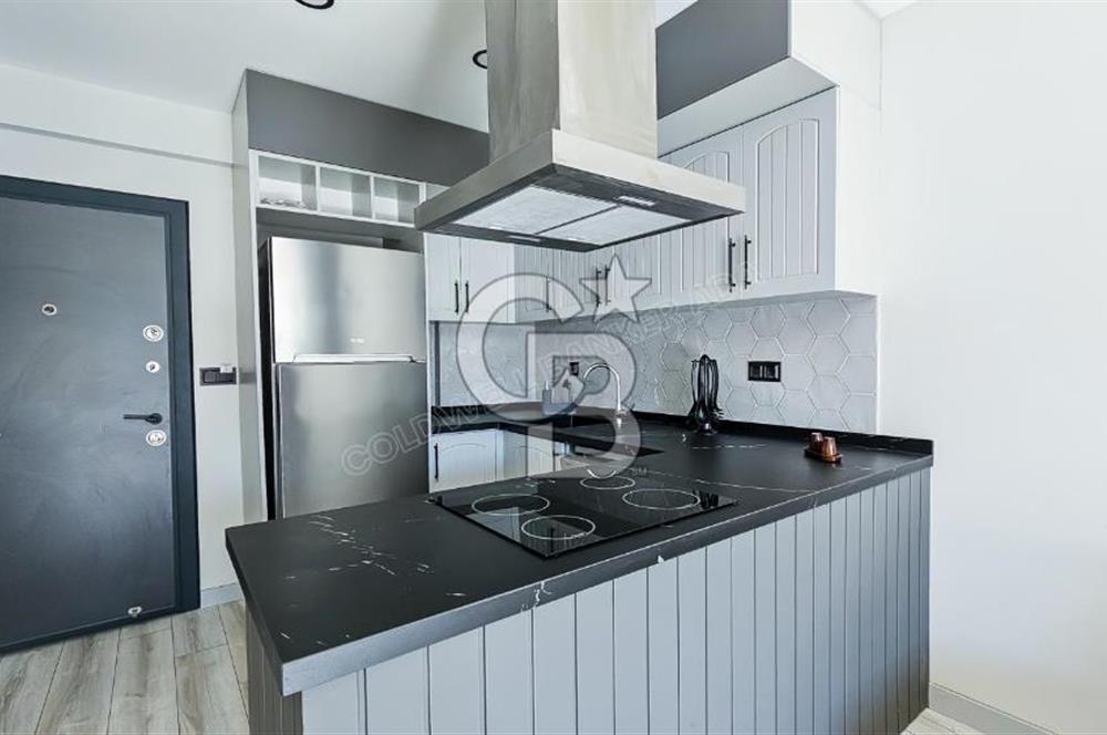 Kuşadası Kuştur Plajı ‘na Yürüme Mesafesinde 1+1 şık eşyalı kiralık daire