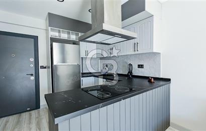 Kuşadası Kuştur Plajı ‘na Yürüme Mesafesinde 1+1 şık eşyalı kiralık daire