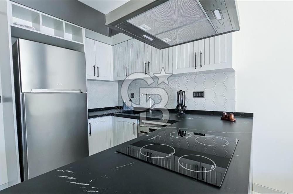 Kuşadası Kuştur Plajı ‘na Yürüme Mesafesinde 1+1 şık eşyalı kiralık daire