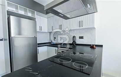 Kuşadası Kuştur Plajı ‘na Yürüme Mesafesinde 1+1 şık eşyalı kiralık daire