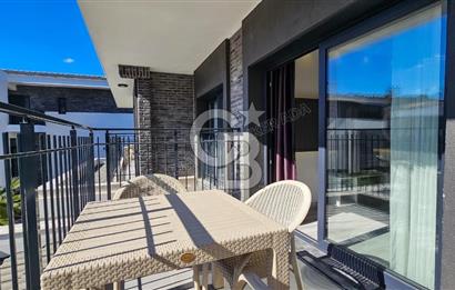 Kuşadası Kuştur Plajı ‘na Yürüme Mesafesinde 1+1 şık eşyalı kiralık daire