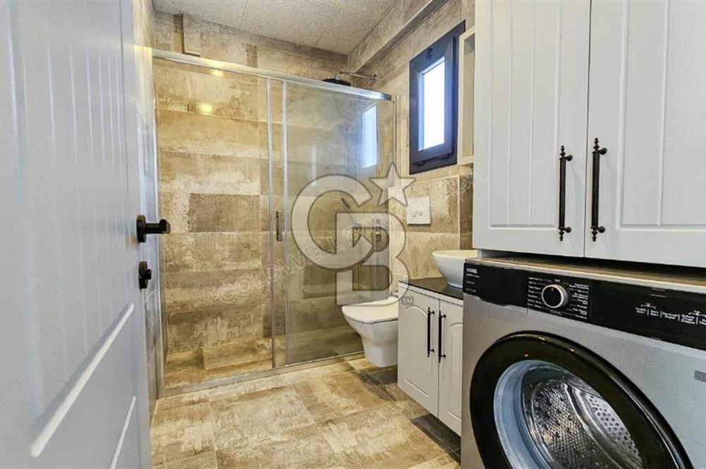 Kuşadası Kuştur Plajı ‘na Yürüme Mesafesinde 1+1 şık eşyalı kiralık daire