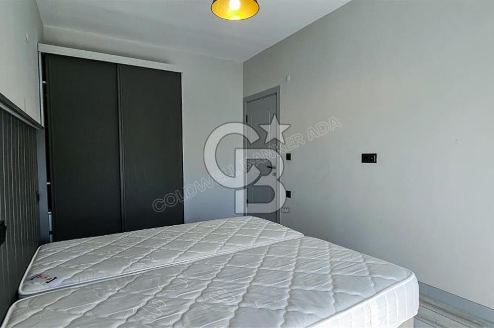 Kuşadası Kuştur Plajı ‘na Yürüme Mesafesinde 1+1 şık eşyalı kiralık daire