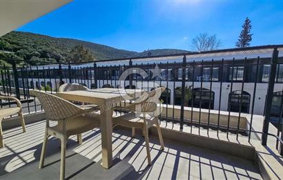 Kuşadası Kuştur Plajı ‘na Yürüme Mesafesinde 1+1 şık eşyalı kiralık daire