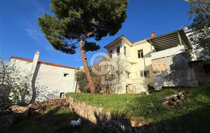 AYVALIK'TA SATILIK DENİZ MANZARALI TAŞ EV VE ARSASI