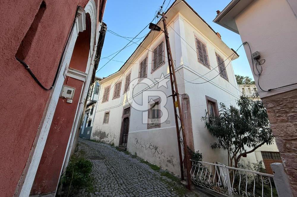 AYVALIK'TA SATILIK DENİZ MANZARALI TAŞ EV VE ARSASI