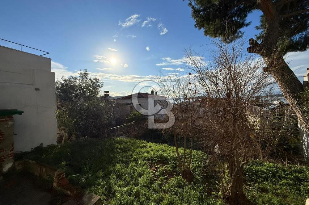 AYVALIK'TA SATILIK DENİZ MANZARALI TAŞ EV VE ARSASI