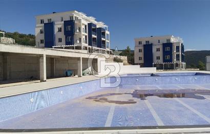 KIYIKIŞLACIK DENİZE 500 METRE 2+1 SIFIR YAZLIK DAİRE