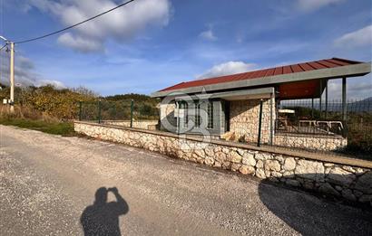 Torbalı Dağkızılca Köyünde Satılık 3069 m2 Tarla ve Taş Ev