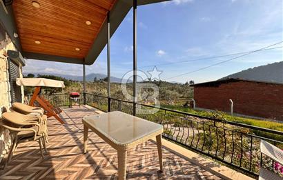 Torbalı Dağkızılca Köyünde Satılık 3069 m2 Tarla ve Taş Ev