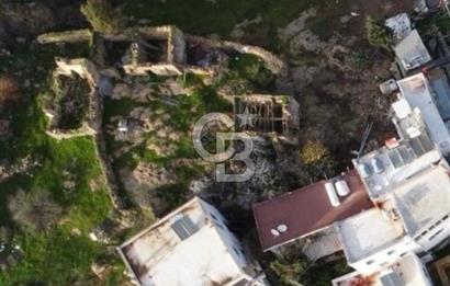 İÇİNDE TESCİLLİ BİNA BULUNAN 132 M2 ARSA