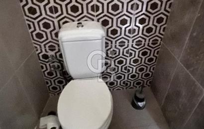 Çiğli Yenimahalle‘de ana yola 70 metre yakınlıkta büro malzemeli kiralık dükkan