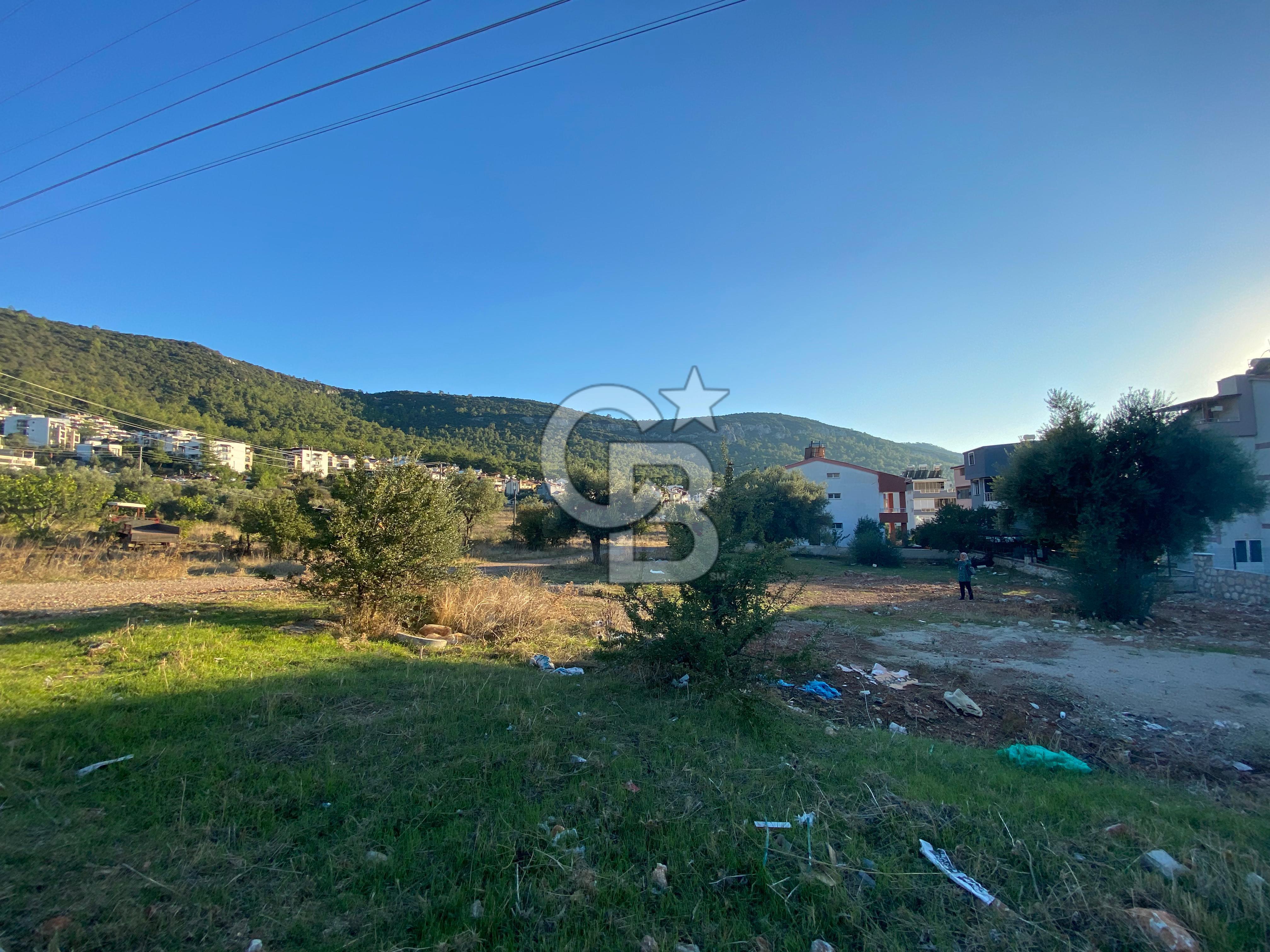 Akbükte Merkezi Konumda Tam Müstakil Villa Arsası!