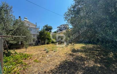 KUŞADASI MERKEZDE DENİZ MANZARALI SATILIK VİLLA İMARLI ARSA