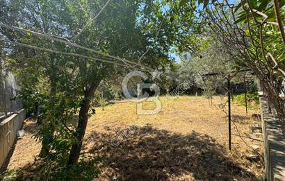 KUŞADASI MERKEZDE DENİZ MANZARALI SATILIK VİLLA İMARLI ARSA