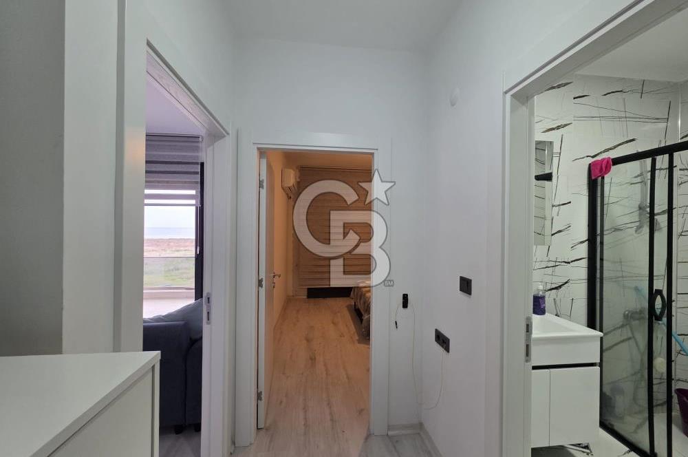 AYVALIK ALTINOVADA DENİZ MANZARALI HAVUZLU SİTEDE 1+1 EŞYALI