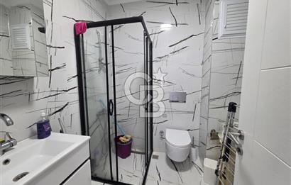 AYVALIK ALTINOVADA DENİZ MANZARALI HAVUZLU SİTEDE 1+1 EŞYALI