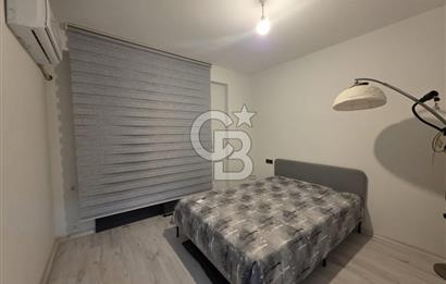 AYVALIK ALTINOVADA DENİZ MANZARALI HAVUZLU SİTEDE 1+1 EŞYALI