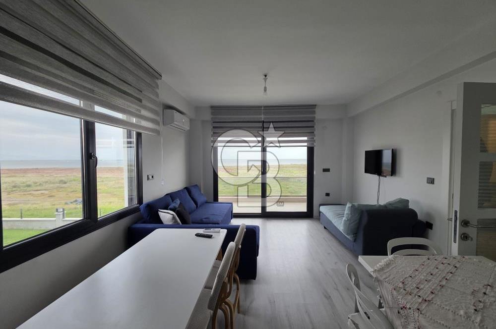 AYVALIK ALTINOVADA DENİZ MANZARALI HAVUZLU SİTEDE 1+1 EŞYALI