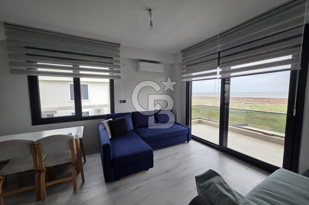 AYVALIK ALTINOVADA DENİZ MANZARALI HAVUZLU SİTEDE 1+1 EŞYALI