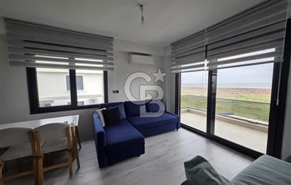 AYVALIK ALTINOVADA DENİZ MANZARALI HAVUZLU SİTEDE 1+1 EŞYALI