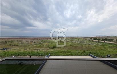 AYVALIK ALTINOVADA DENİZ MANZARALI HAVUZLU SİTEDE 1+1 EŞYALI