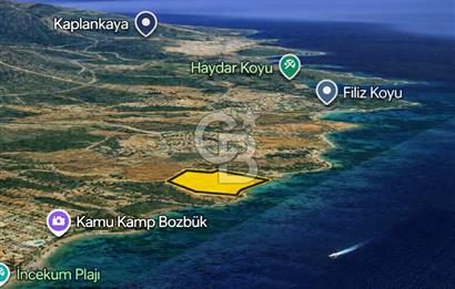 Muğla Bozbük Bölgesinde Denize Sıfır Turizm Planlama Alanında Satılık Büyük Parsel Arazi