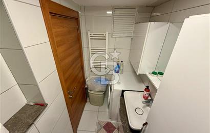 İZMİR KARŞIYAKA ALAYBEY’DE MERKEZİ KONUMDA, KAPALI MUTFAKLI 2+1 DAİRE