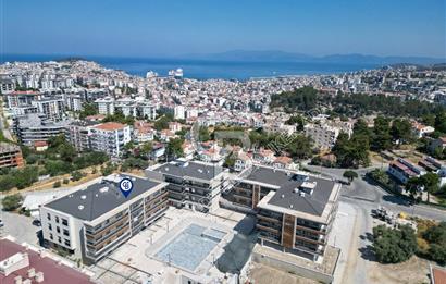 KUŞADASI İKİÇEŞMELİK MAHALLESİNDE OTOPARKLI GÜVENLİKLİ YENİ 1+1  DAİRE