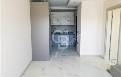 KUŞADASI İKİÇEŞMELİK MAHALLESİNDE OTOPARKLI GÜVENLİKLİ YENİ 1+1  DAİRE