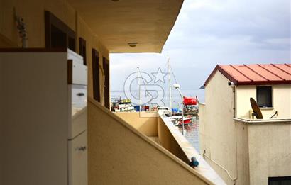 Urla Çeşmealtı'nda Denize Sıfır Binada Manzaralı Kiralık 1+1 Daire