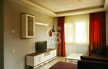 Urla Çeşmealtı'nda Denize Sıfır Binada Manzaralı Kiralık 1+1 Daire