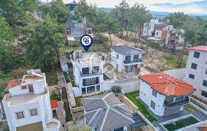 SOĞUCAK KUŞADASI’NDA SATILIK DENİZ MANZARALI ÖZEL HAVUZLU 3+2 TRİPLEKS VİLLA