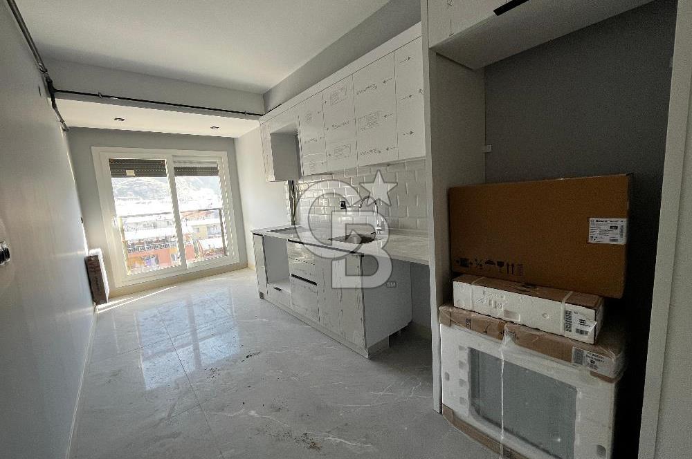 ÇİĞLİ UĞUR MUMCU'DA KİRALIK 2+1 KAPALI MUTFAKLI SIFIR DAİRE