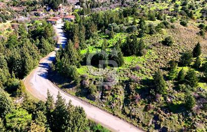 Datça Sındı Köyü'nde 5.159 m² Yol Cepheli ve Manzaralı Tarla 