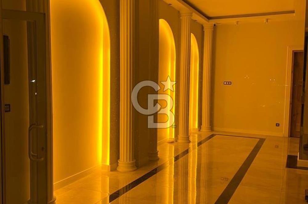 Çubuklu sahilde deniz manzaralı dükkan