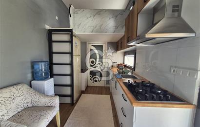 AKARCA SAHİLDE İÇİNDE TINY HOUSE BULUNAN SATILIK ARSA 