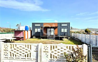 AKARCA SAHİLDE İÇİNDE TINY HOUSE BULUNAN SATILIK ARSA 