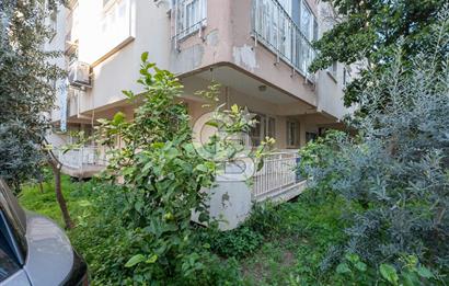 Bostanlı Şehitler Bulvarı Yakını Geniş Bahçeli 3+1 Satılık Daire