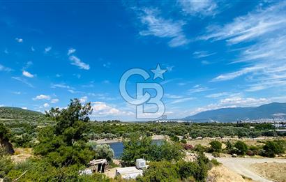 BORNOVA HOMEROS VADİSİNDE GÖLE KOMŞU SATILIK ARSA