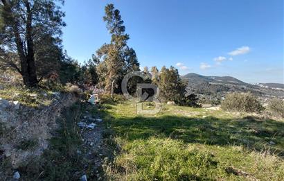 Gaziemir Yeşil Mahalle’de Yolu Olan Önü Açık Manzaralı Parsel