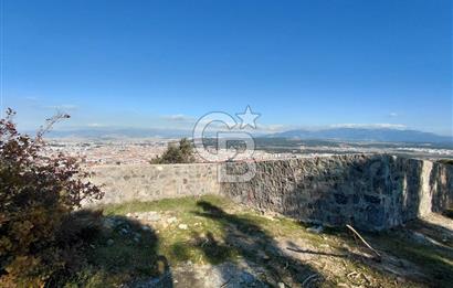 Gaziemir Yeşil Mahalle’de Yolu Olan Önü Açık Manzaralı Parsel
