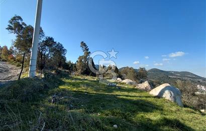 Gaziemir Yeşil Mahalle’de Yolu Olan Önü Açık Manzaralı Parsel
