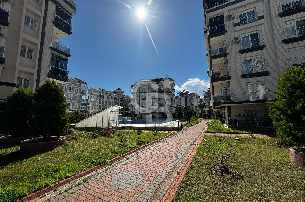 Hurma'nın Prestijli Sitesinde Havuz Manzaralı, Eşyalı 1+1 Daire