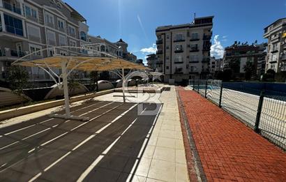 Hurma'nın Prestijli Sitesinde Havuz Manzaralı, Eşyalı 1+1 Daire