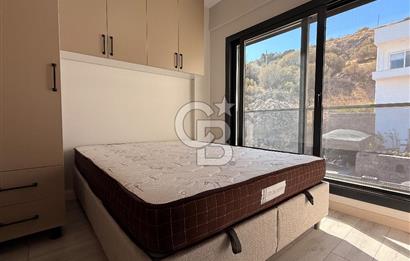 ÇANDARLI'DA DENİZ MANZARALI HAVUZLU SATILIK TRİPLEVİLLA