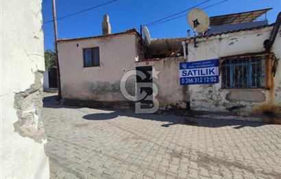 Ayvalık Mutluköy'de Satılık müştemilatlı müstakil ev ve arsa