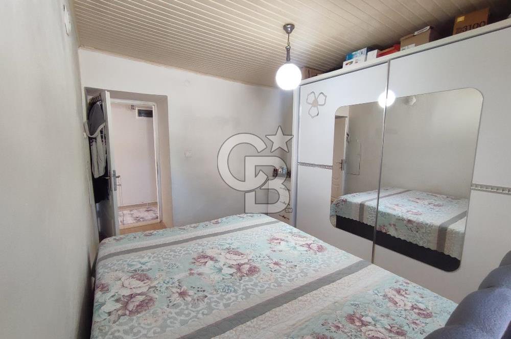 Ayvalık Mutluköy'de Satılık müştemilatlı müstakil ev ve arsa